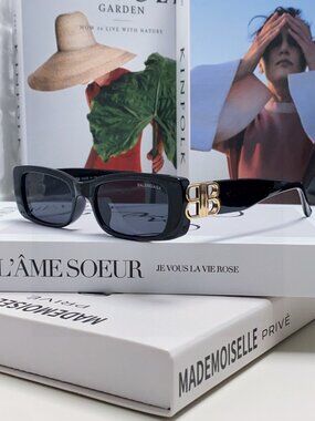 Balenciaga Black Sunglasses with Gold Accents